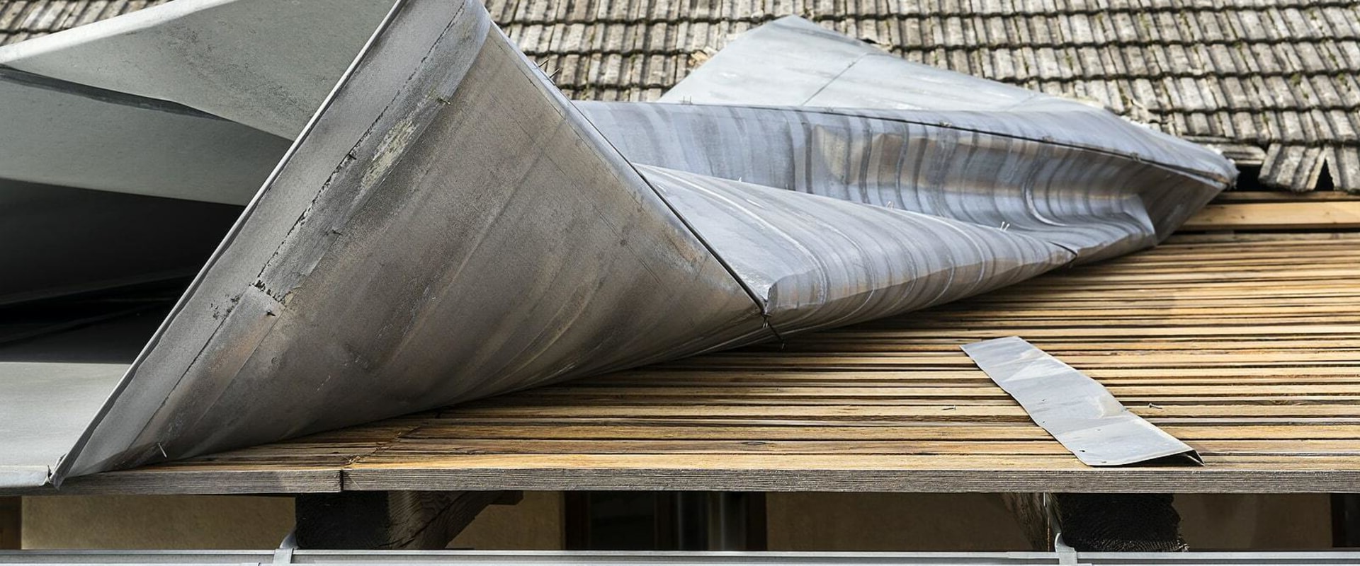 What are the disadvantages of having a metal roof?