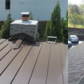 How much more expensive is a metal roof compared to shingles?